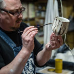 Richard Heeley at work in his pottery in Shropshire Feb 2018